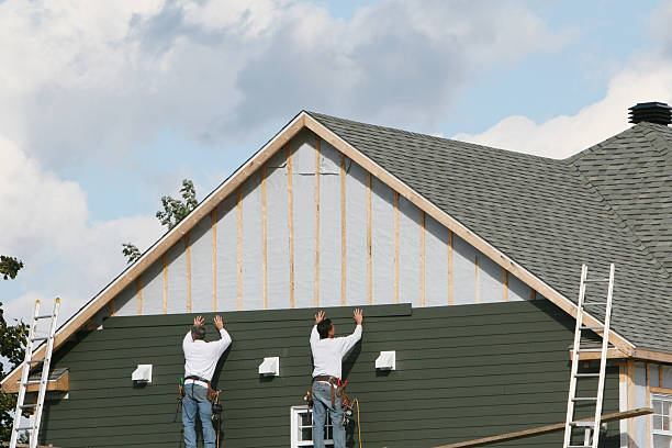 Professional Siding Contractor technician working in Bloomington, IN